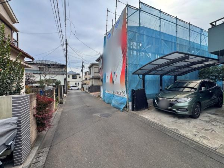 �����s���c�s�쒬�c1���ڂ̐V�z��ˌ��Ă̑O�ʓ��H�܂ތ��n�ʐ^