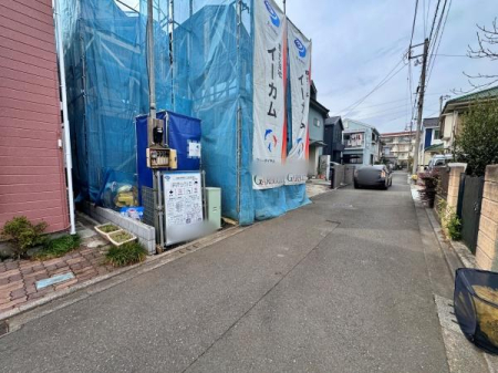 �����s���c�s�쒬�c1���ڂ̐V�z��ˌ��Ă̑O�ʓ��H�܂ތ��n�ʐ^